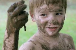 kid in mud