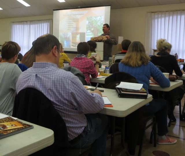 Neil, explaining bee diseases and control